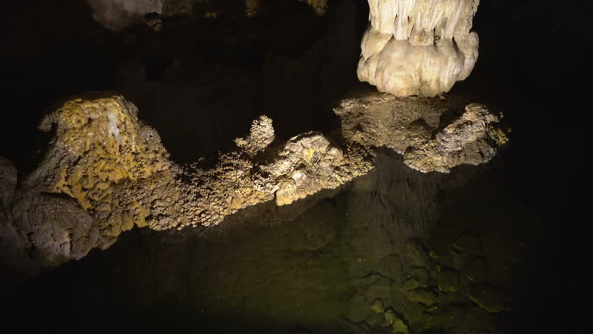 Tracking shot with tilt up motion of stalagmite in Carlsbad Caverns National Park in New Mexico -Version 1-