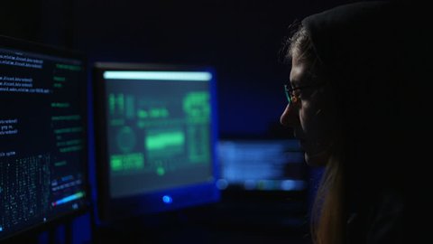 keyboard, a girl hacker cracks a password