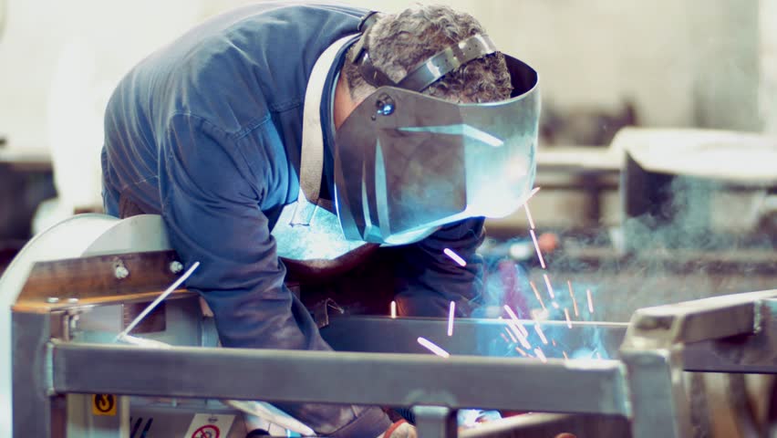 Metal Worker Welding in factory, an Industrial Video by Enrico Fianchini