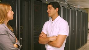 Technicians talking in the server room in high quality format - Powered by Shutterstock - Get 15% off with code: PIKWIZARD15