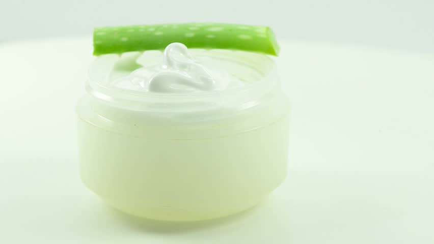 Aloe vera leaf and cream pot on a turn table
 | Shutterstock HD Video #14923447