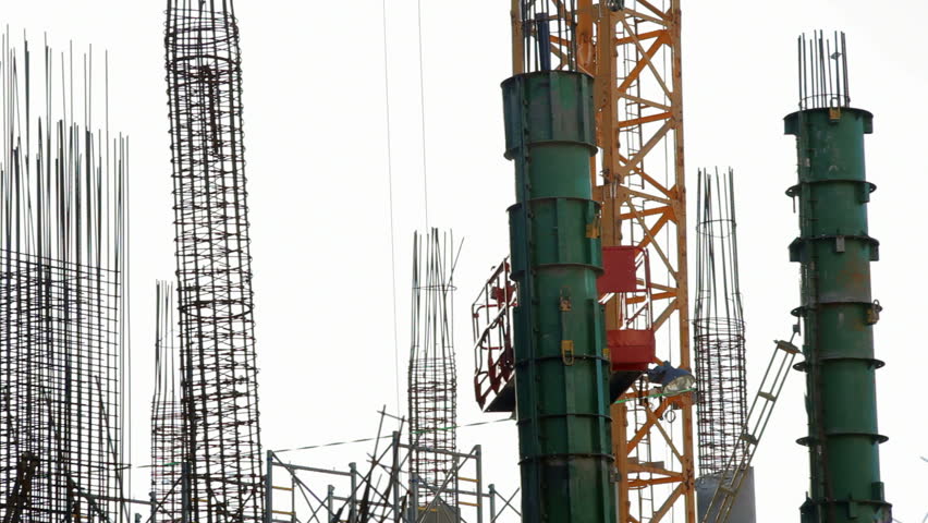 Man uses construction site elevator, skyscraper building, Tel-Aviv, Israel