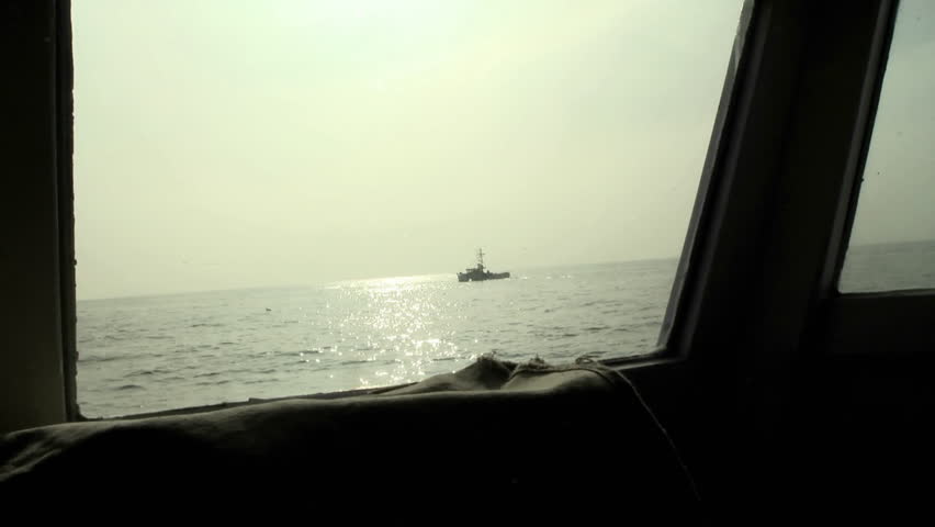 A ship navigates on the open seas.