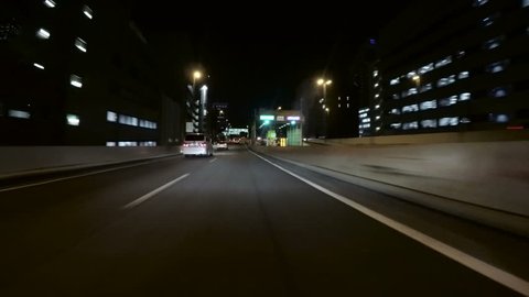 March 3, 2016. Hakozaki, Japan - Nightscape on the highway through the financial district and Hakozaki junction.