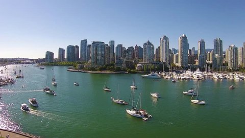 Aerial footage of the Vancouver skyline at False Creek, Vancouver Canada