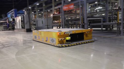 Manufacturing Plant, Ceramic tiles manufacturing, AGV transports products, Electrical Automated Guided Vehicles Platform, Automatic stacker,  modern plant, Industrial interior, warehouse interior, 