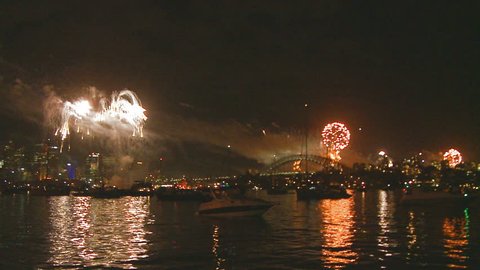 SYDNEY, AUSTRALIA. DECEMBER 31 2012. Sydney New Year's Eve fireworks over the city, slow motion zoom out and with sound 1