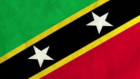 Kittitian or Nevisian flag waving in the wind (full frame footage in 4K UHD resolution)