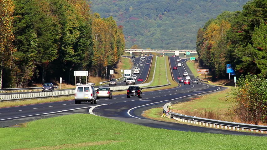 Traffic passes on route 52 near Pilot Mountain, North Carolina.