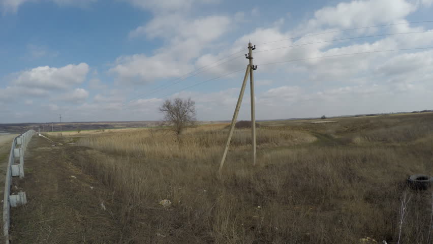 Walk POV near spring river. Time lapse.