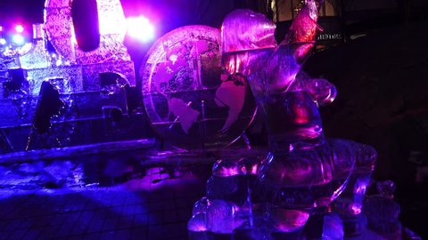 TORONTO - FEB 21: Illuminated ice sculptures with “Expressions of Love” theme on display at the 11h Annual Icefest Competition at Yorkville Village, Toronto, Canada, February 21, 2016