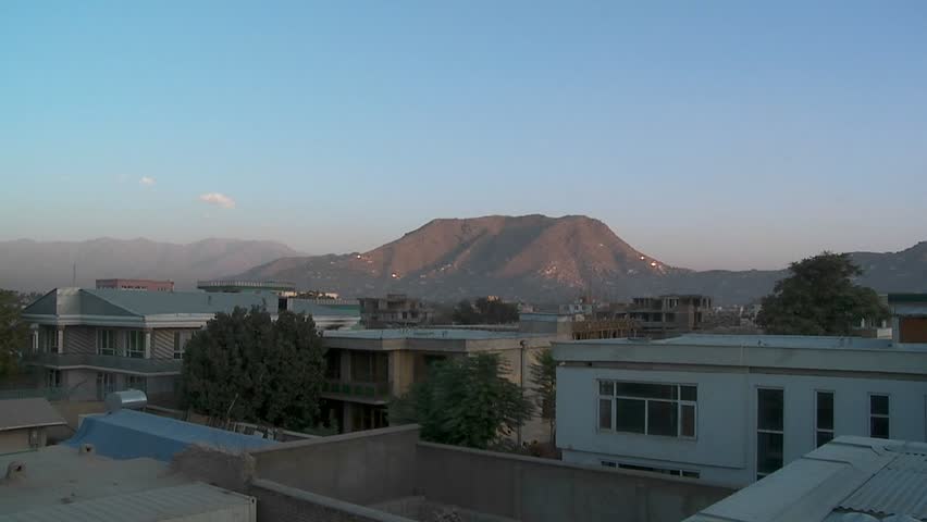 Slow pan of residential neighborhood in Kabul, Afghanistan.