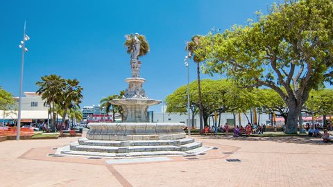 Nouméa New Caledonia Place des Cocotiers a City Center Park with Locals and a Water Fountain Statue