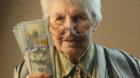 Old woman rejoices money