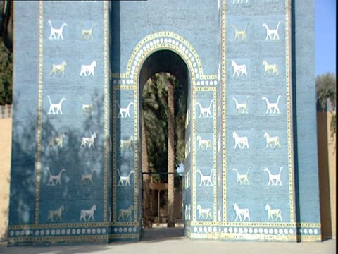 Babylon, Iraq - 2002 - Tilt down of a replica of the Ishtar Gate. The gate shows alternating rows of animals (aurochs and dragons) representing the gods Marduk and Adad.