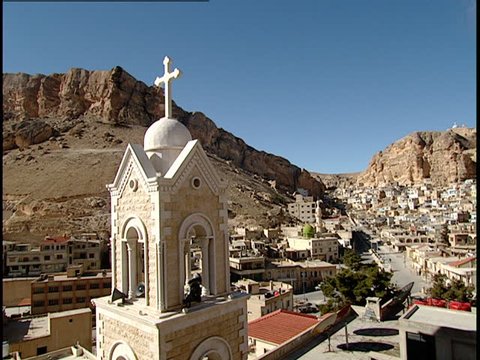Maaloula, Syria - 2005 - A Christian cross tops the bell tower on a church in Maaloula.