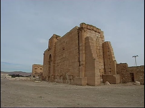 Palmyra, Syria - 2005 - Shot of a massive temple wall with archway from the Temple of Bel, Palmyra. Palmyra is a UNESCO World Heritage Site.