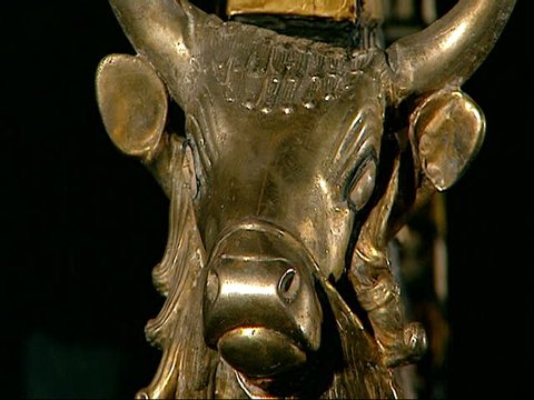 Iraq National Museum, Baghdad, Iraq - 2002 - The Golden Bull Lyre of Ur c. 2450 BC (Code: IM 8694). Zoom out from a bearded Bull\xCDs head decorating a lyre inlaid with mother of pearl and gold.