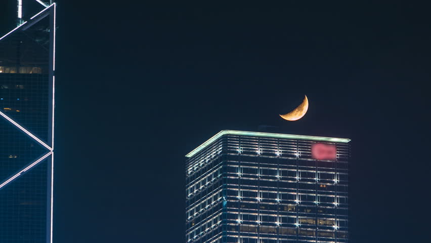 Abstract futuristic cityscape view with modern skyscrapers at moon night timelapse. Hong Kong
