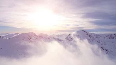 Aerial Drone Flight Over Mountain Range Through Clouds At Sunset Morning Mist Sun Light Flare Sunrise Beauty Inspiration Religion Worship God'S View Concept UHD 4K