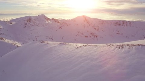 Beautiful Aerial Drone Flight Reveal Sunset In The Mountains Inspirational Background Sunrise Winter Nature Landscape Beauty UHD 4K