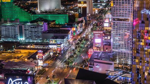 Las Vegas, Nevada, USA - February 24, 2016:  Las Vegas strip night traffic time lapse with zoom out.