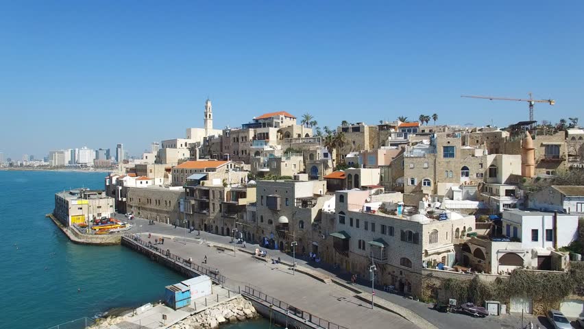 Aerial footage of the old city of Jaffa and tel Aviv skyline