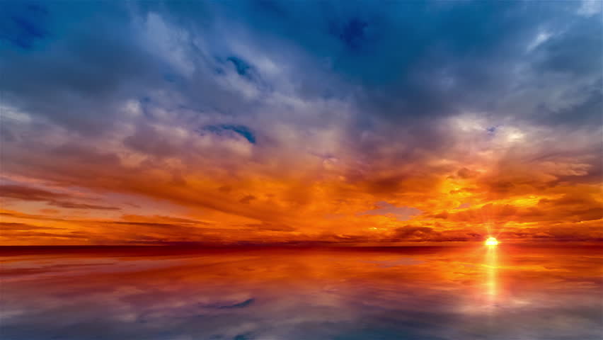 Beautiful cloudscape and sunset breaking through cloud over lake reflection. god rays, also called crepuscular rays, streaming through gaps in clouds. Time lapse 4K