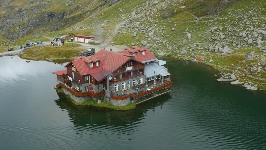 Aerial shot of a chalet, Balea Lake
