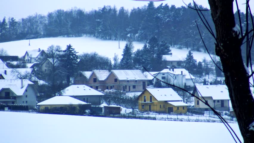 Snowy houses in small village - landscape