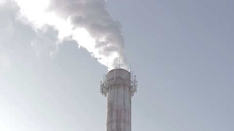 Smoking chimneys against the sky, pollution