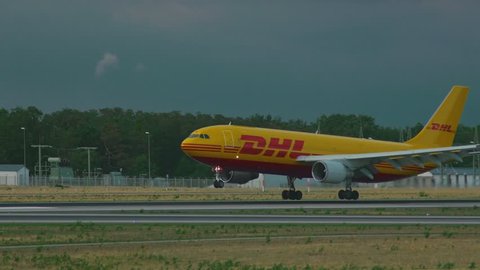FRANKFURT AM MAIN, GERMANY - SEPTEMBER 5, 2015: DHL Airbus 300 D-AEAM landing on runway 25R. Unofficial spotting in Fraport on Sep. 5, 2015