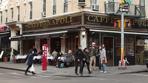 New York, New York, USA -  March 8, 2016: Caffe Napoli an Italian Restaurant in the Little Italy section of Lower Manhattan at the intersection of Mulberry and Hester Street. People can be seen.