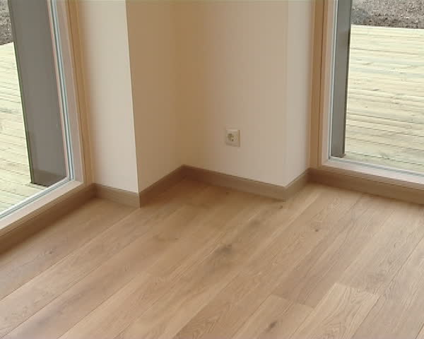 Newly built house with large windows facing the courtyard. 