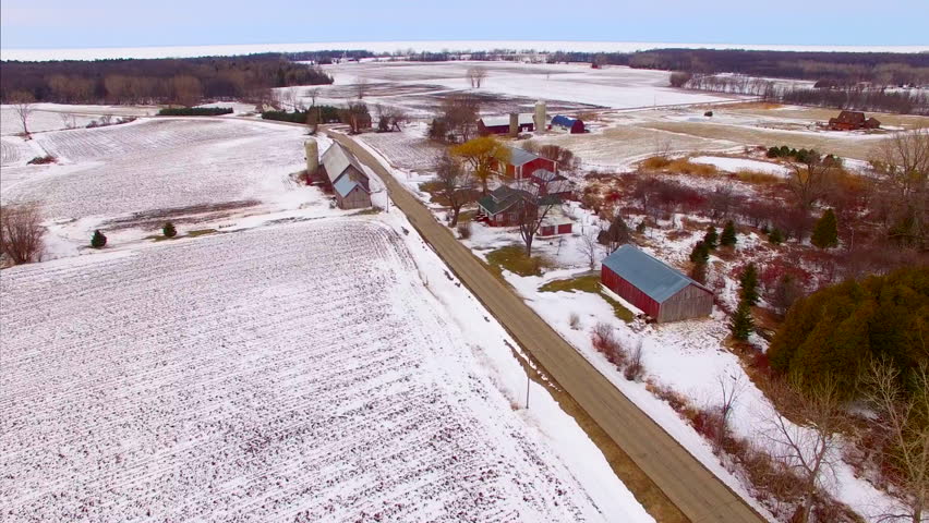 Aerial flight over scenic Door County Wisconsin in Winter. Northeast Wisconsin’s Door Peninsula is known for it’s rustic appeal and many vacation destinations