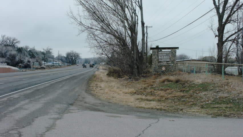 This is a shot of the welcome to aztec sign in NM. Founded in 1887. Its a drive by POV shot. Shot on a BMCC with Ziess 15mm