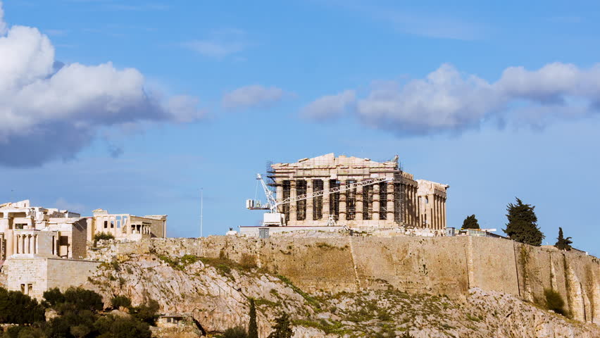 Acropolis rock wide view zoom out timelapse 25p.Wide view zoom out in timelapse of the rock of Acropolis in Athens,Greece.All unwanted elements have been removed digitally.Clean shot.