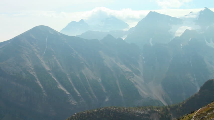 Hikers on a steep trail in the Canadian Rockies
