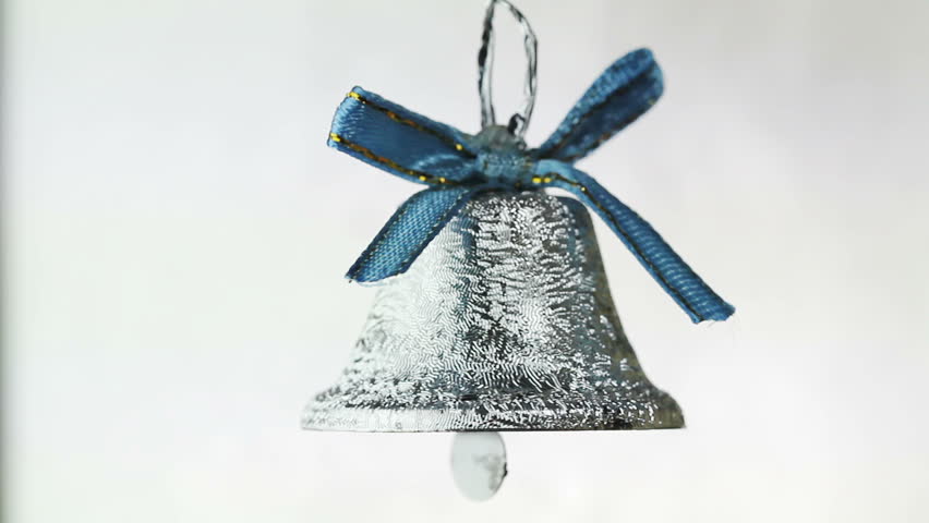 New Year's bell on a white background closeup