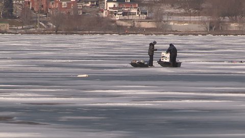 Barrie, Ontario, Canada March 2016 Dangerous thin unsafe ice in with people on it in Barrie Canada
