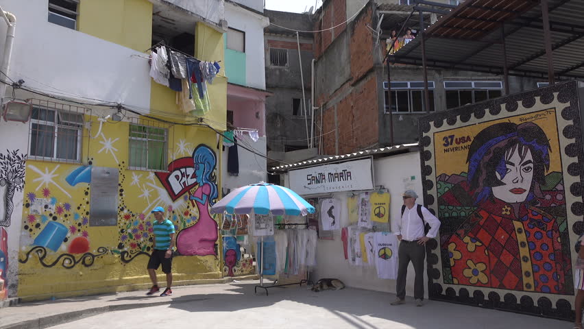 RIO DE JANEIRO, BRAZIL - FEBRUARY 06, 2016: Unidentified people visit Michael Jackson square in the shanty town of Santa Marta favela. Scenes for the video They Don't Care About Us were filmed here. | Shutterstock HD Video #15196558