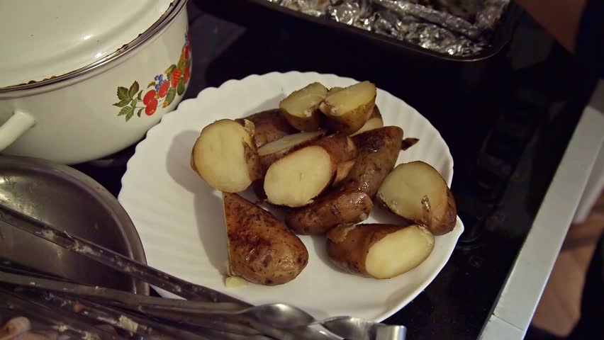 baked potatoes piled in a bowl