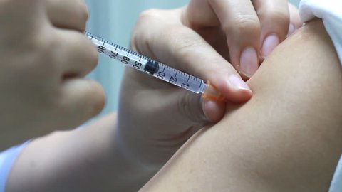 closeup of injection vaccine 