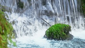 Magnificent Waterfall in Closeup in a Beautiful Nature, Beautiful waterfall in nature in close up in slow motion, Slow Motion Video Clip