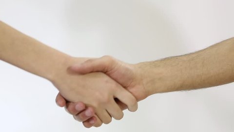 closeup of hand shake of nude man and woman on white background isolated. Woman and man hands greeting several ways.