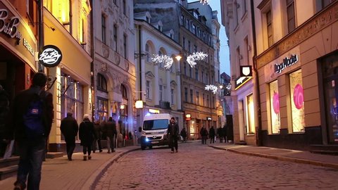 Riga - Latvia, March 6, 2016: Police car on the street of Old Riga at night