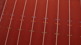 4K Drone footage of USA Athletics team doing lap of honor on running track