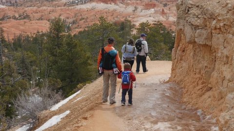 A family hiking in beautiful Bryce Canyon National Park in Southern Utah