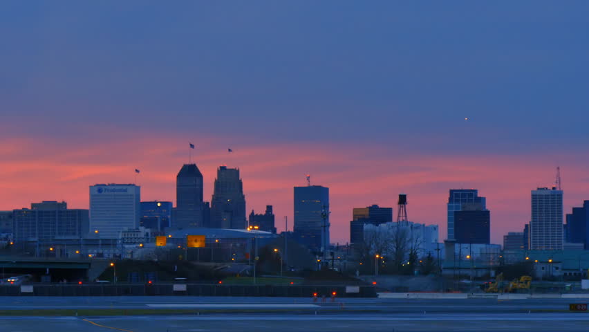 establishing shot of newark city cityscape at sunset financial district in the background