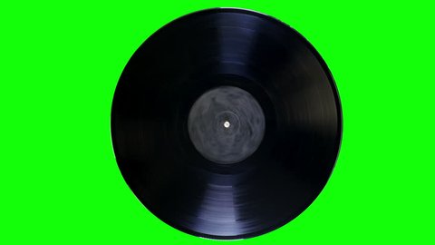 Vinyl Record is Rotating on a Green Screen